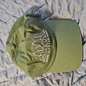 Green ball cap Austin Texas skyline